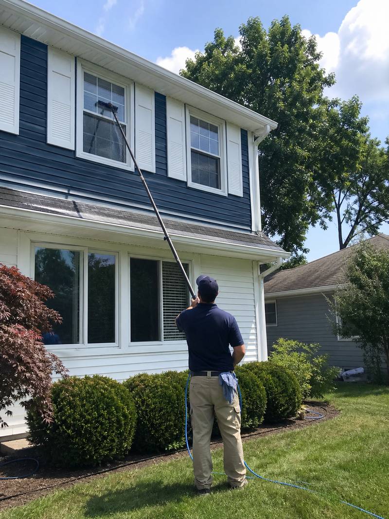 Exterior window cleaning with a water-fed pole